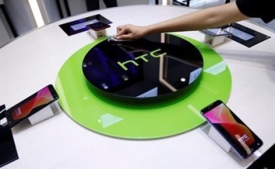  Chịu thua Samsung và Apple, HTC chuẩn bị bán mình?